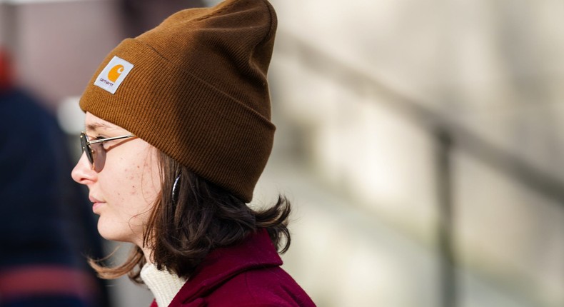 A woman wears a Carhartt beanie during Paris Fashion Week.Edward Berthelot/Getty Images