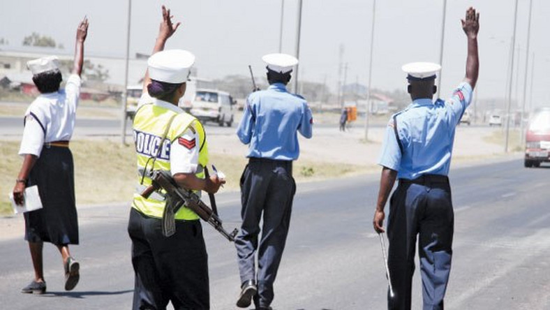 A police roadblock. Traffic Officers’ open fire at EACC detectives