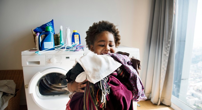 Lisa Malot Gare — whose son is not pictured in this image— sets down clear expectations for her kids to help around the house.Rawpixel/ Getty Images