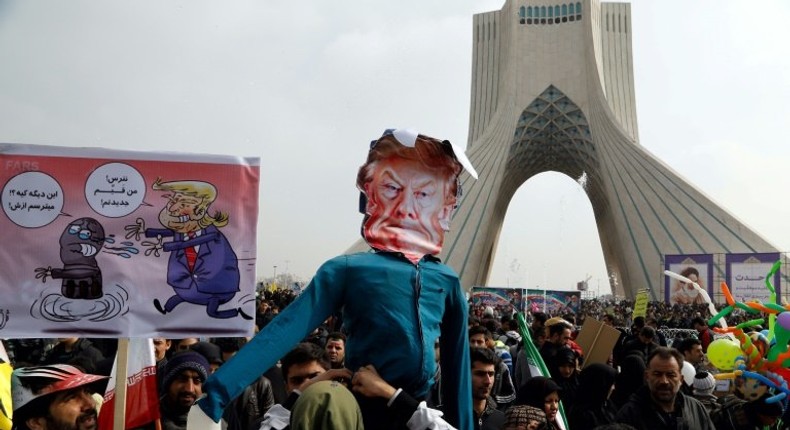 Iranians hold up a dummy representing US President Donald Trump during a rally in the capital Tehran on February 10, 2017 marking the anniversary of the 1979 Islamic revolution