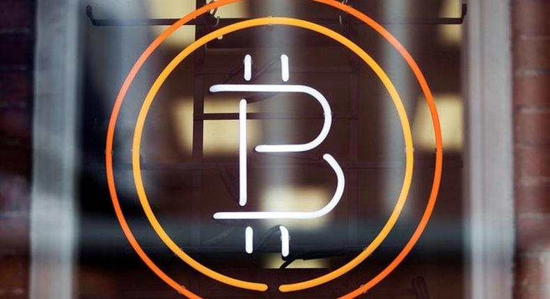 A bitcoin sign in a window in Toronto.