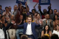 French Economy Minister Emmanuel Macron attends a political rally for his recently launched politica