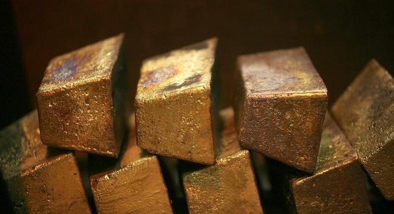 Gold bars are displayed at South Africa's Rand Refinery in Germiston May 30, 2006. 