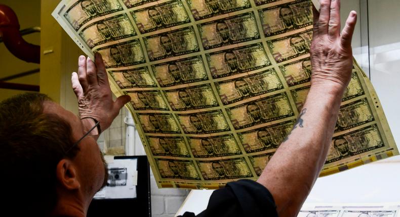 The US dollar slipped under 1% over the past quarter – but analysts are warning there could be troubles ahead for the greenback.EVA HAMBACH/Getty Images