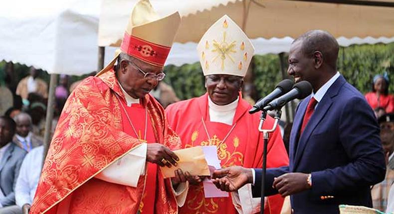 File image of DP William Ruto, John Cardinal Njue (left) during a fundraiser at a Catholic Church