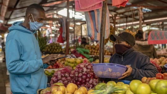 A food vendor selling to a client