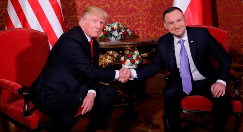 President Donald Trump is greeted by Polish President Andrzej Duda as he visits Poland during the Three Seas Initiative Summit in Warsaw, Poland July 6, 2017.