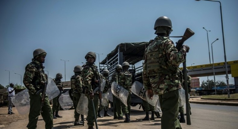 Kenyan police arrive to break up a protest from opposition supporters in Kisumu, western Kenya, on August 9, 2017