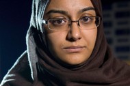 FILE PHOTO: Renu Begum, sister of teenage British girl Shamima Begum, holds a photo of her sister as