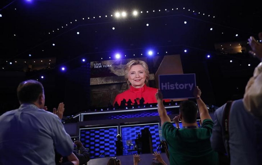 Democratic US presidential nominee Hillary Clinton appears on a video monitor at the Democratic National Convention in Philadelphia.