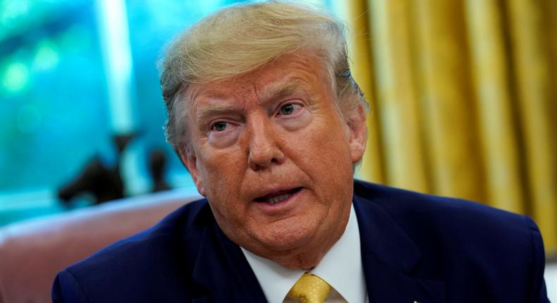 FILE PHOTO: U.S. President Donald Trump speaks during a meeting with China's Vice Premier Liu He in the Oval Office at the White House after two days of trade negotiations in Washington, U.S., October 11, 2019. REUTERS/Yuri Gripas/File Photo