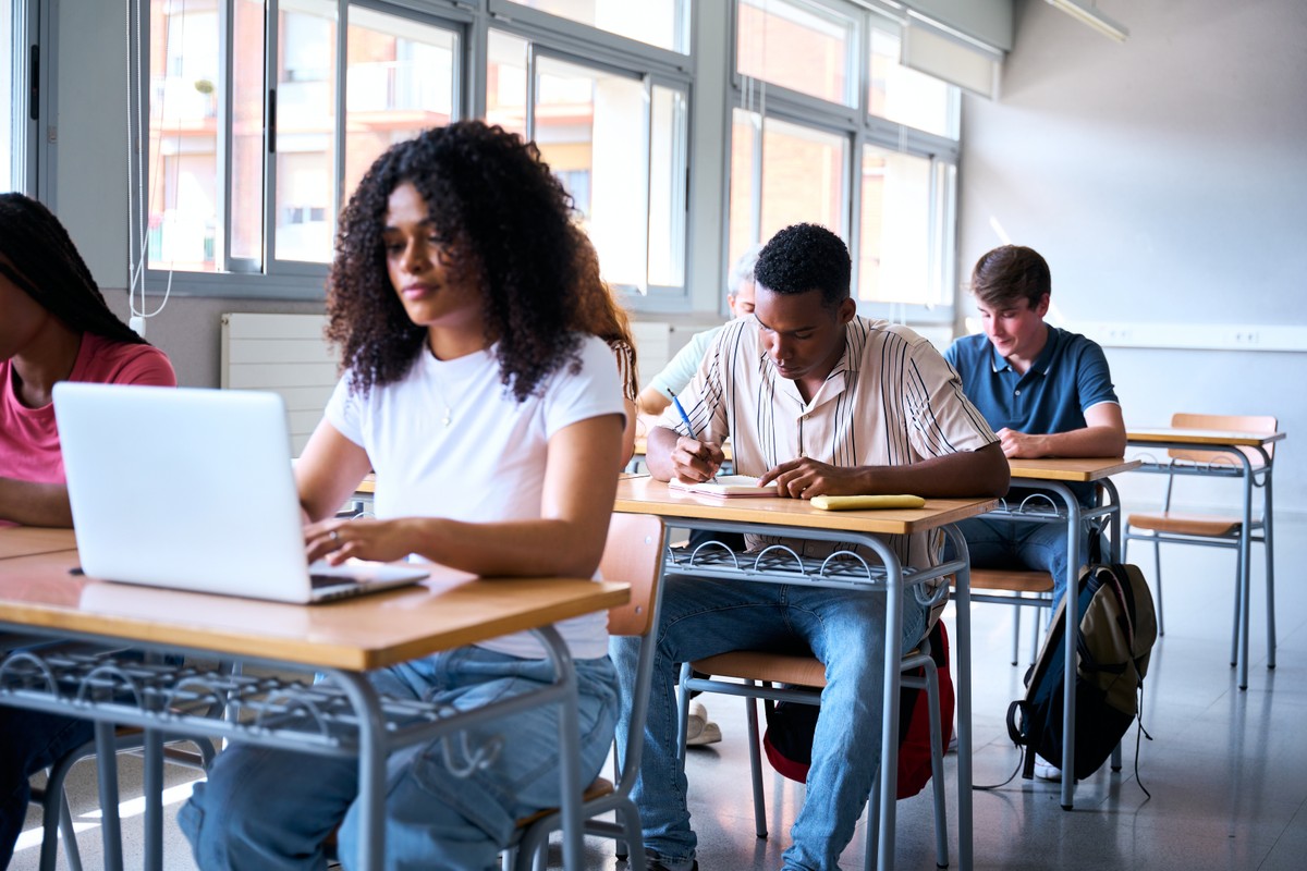 Young,People,Concentrate,On,Academic,Tasks,Using,Digital,Tools,And