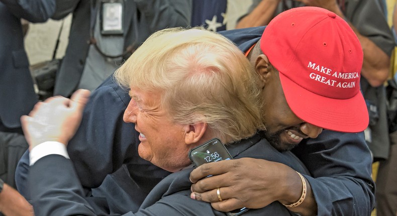 American rapper and producer Kanye West embraces then-President Donald Trump in the White House's Oval Office, Washington DC, October 11, 2018.Ron Sachs/Consolidated News Pictures/Getty Images