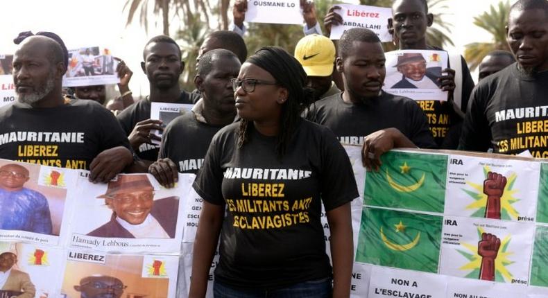 Anti-slavery activists demonstrate in Dakar, Senegal, against the imprisonement of fellow activists in Mauritania, on August 3, 2016 