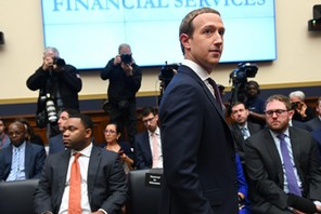 Facebook Chairman and CEO Zuckerberg arrives to testify at a House Financial Services Committee hearing in Washington