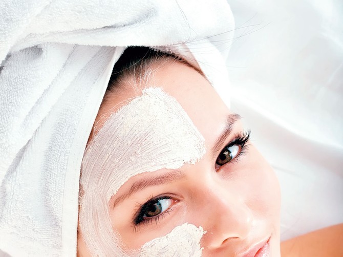 12771_stock-photo-young-woman-with-clay-facial-mask-shutterstock_60488761
