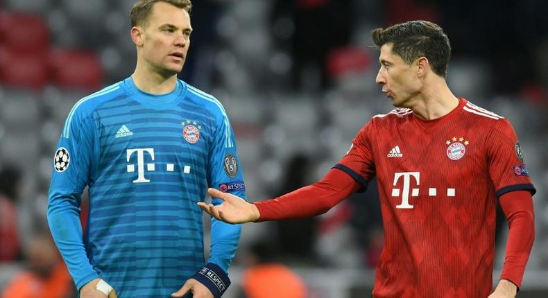 Bayern Munich's Germany goalkeeper Manuel Neuer and Polish forward Robert Lewandowski count the cost of their Champions League exit