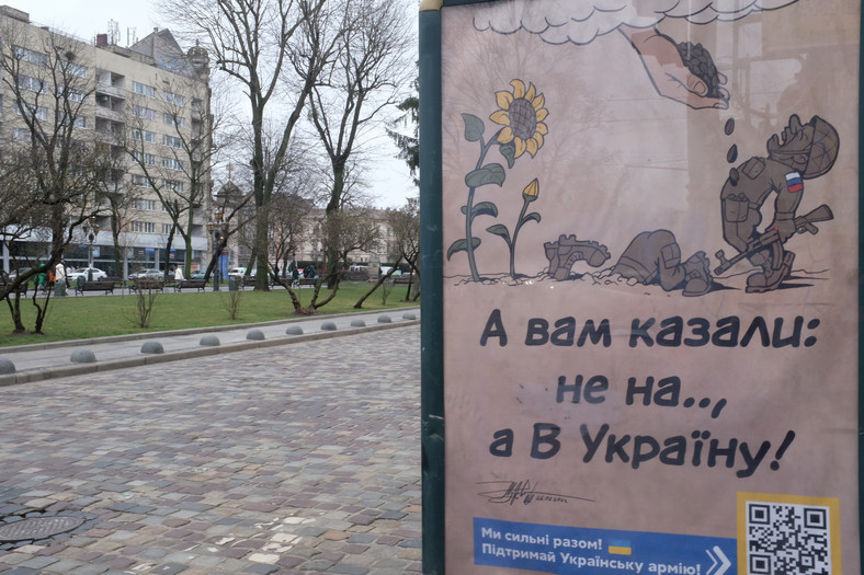 Plakat przedstawia rosyjskich żołnierzy, którzy stają się słonecznikami w Ukrainie