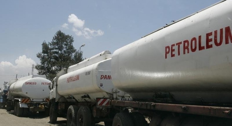 Trucks transporting oil, petrol and gas wait to reload outside a depot in the outskirts of Nairobi September 30, 2008.   REUTERS/Antony Njuguna