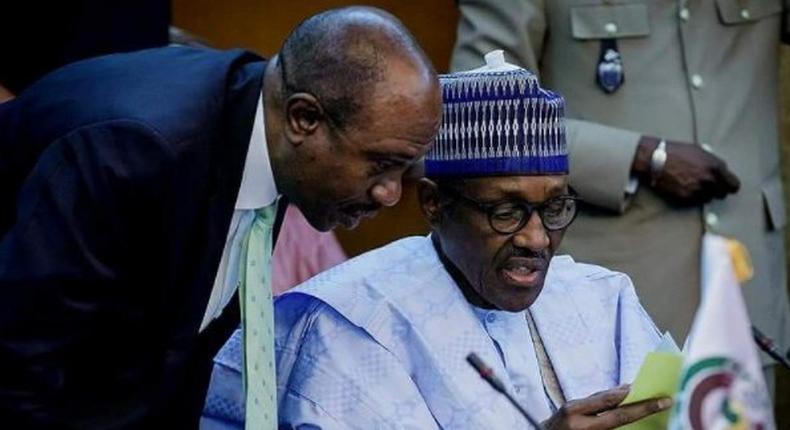 President Muhammadu Buhari (right) and CBN governor, Godwin Emefiele (left) [Breaking Times]