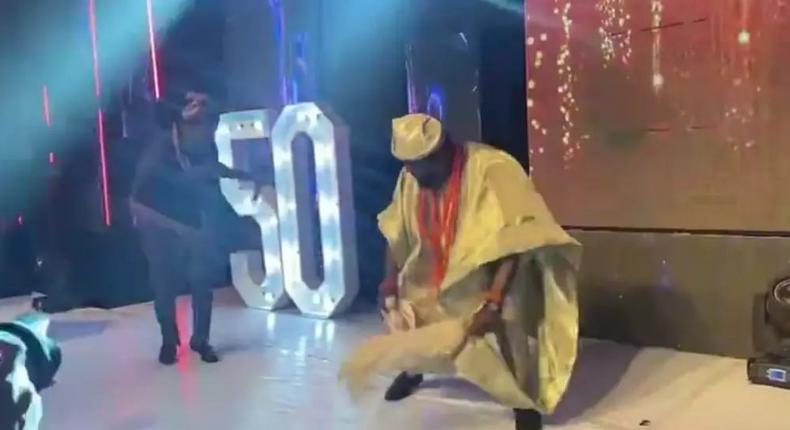 Comedian AY Makun dancing with King Sunny Ade at his birthday party 