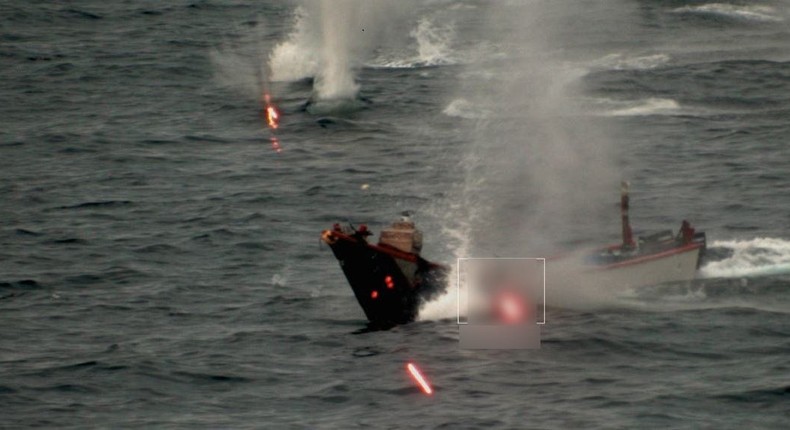 A hostile drone boat comes under fire from a French warship in the Red Sea.French military photo