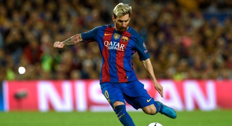 Barcelona's forward Lionel Messi kicks the ball during the UEFA Champions League football match FC Barcelona vs Manchester City at the Camp Nou stadium in Barcelona on October 19, 2016