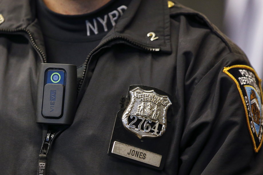 A police body camera on an officer during a news conference on the pilot program involving 60 NYPD officers dubbed "Big Brother" at the NYPD police academy in Queens, New York, December 3, 2014.