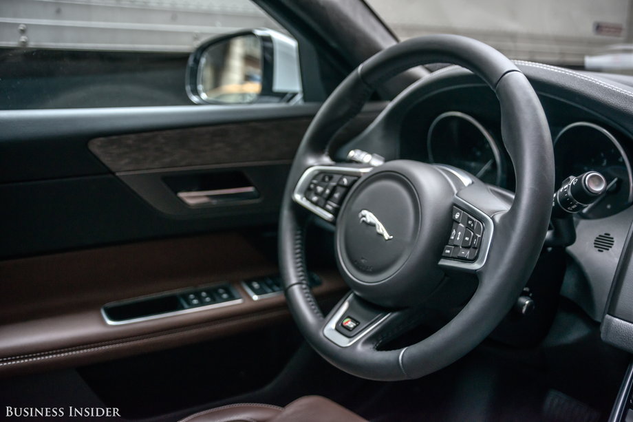 The XF's cockpit is posh but functional. The driver is treated to Jaguar's easy-to-use steering wheel.