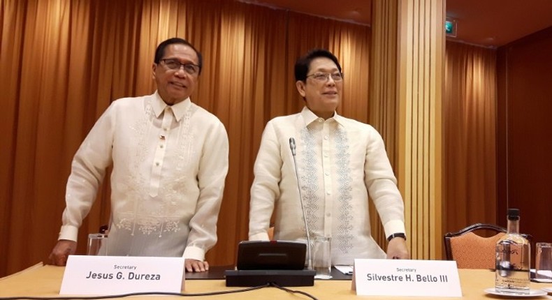 Philippines' Presidential Advisers on the Peace Process Jesus Dureza (L) and Silvestre H. Bello III take part in a meeting as part of the peace talks between the Government of the Philippines and the NDF on April 2, 2017