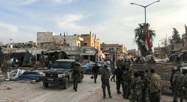Syrian army soldiers in the town of Saraqib in the northwestern Idlib province on March 6, 2020, as government forces assumed control over the town