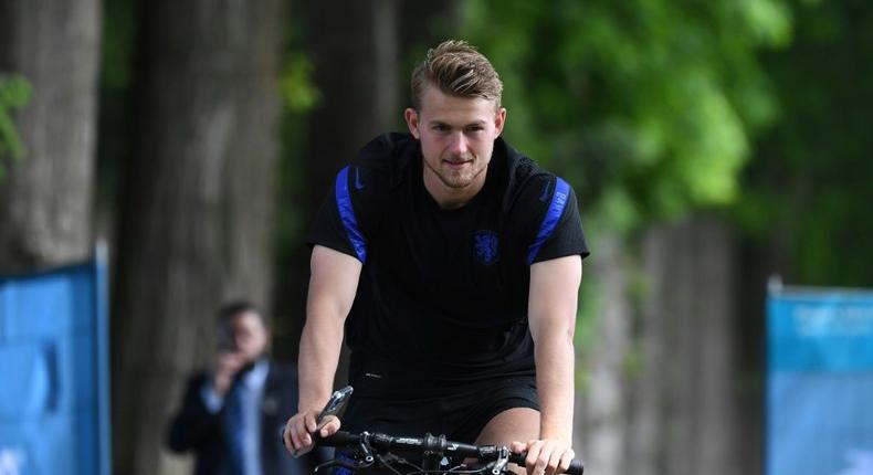 Matthijs de Ligt riding a bike at the Netherlands team training camp in Zeist on Saturday Creator: JOHN THYS