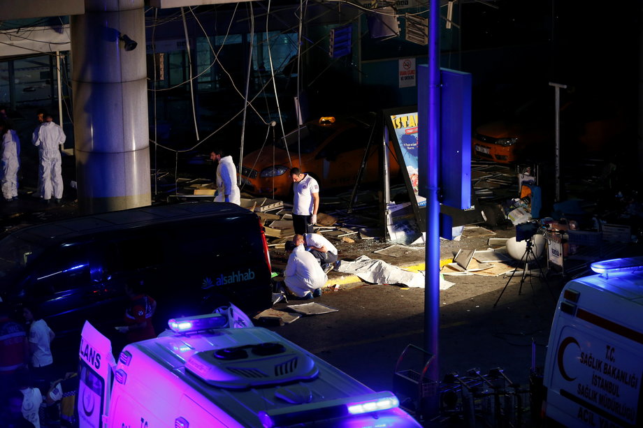 Forensic experts work outside Turkey's largest airport, Istanbul Ataturk, after a blast on June 28.