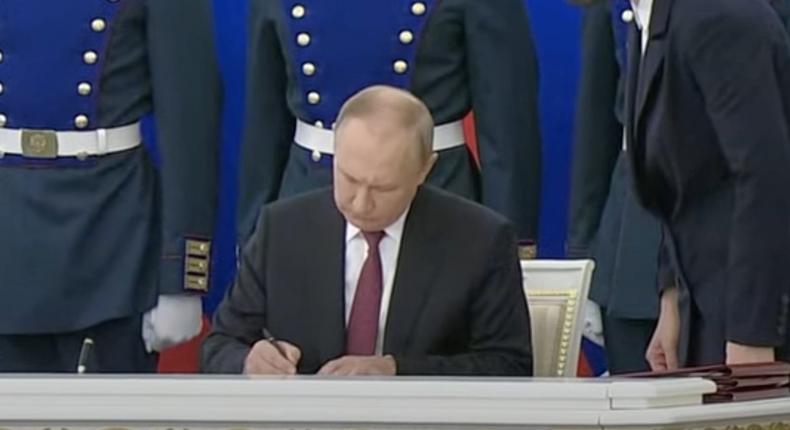 Russian President Vladimir Putin signs annexation documents in Moscow, Russia, on September 30, 2022.