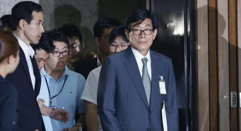 South Korea court orders retrial of ex-spy chief in vote-meddling case