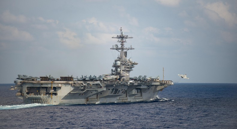 An F/A-18F Super Hornet launches from the flight deck of the aircraft carrier USS Theodore Roosevelt, which was sent to the Middle East in June.US Navy/Mass Communication Specialist 3rd Class Nicholas V. Huynh/Handout via REUTERS