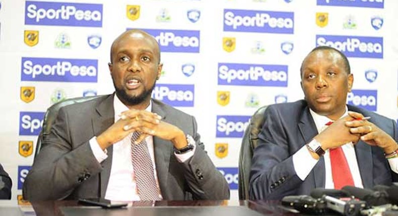 File image of SportPesa Chief Executive Officer Ronald Karauri (left) flanked by Kirimi Kaberia