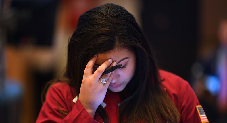 A trader reacts during the opening bell at the New York Stock Exchange (NYSE) on February 28, 2020 at Wall Street in New York City.
