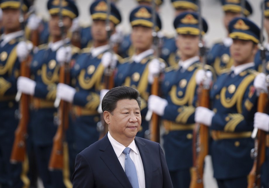 China's President Xi Jinping inspects honour guards during a welcoming ceremony outside the Great Hall of the People in Beijing, China.