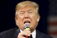 Republican U.S. presidential candidate Trump addresses a crowd during a presidential forum in Aiken