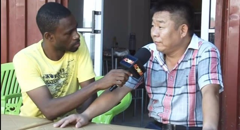 One of the Chinese national speaking to Accra-based Adom FM