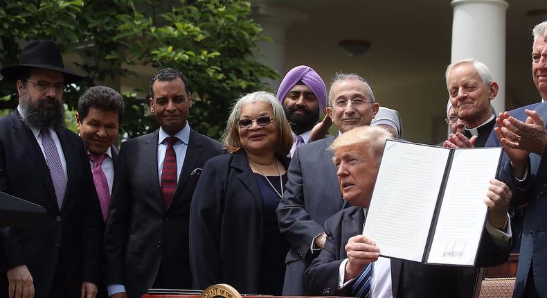 Donald Trump with religious leaders at the White House on Thursday