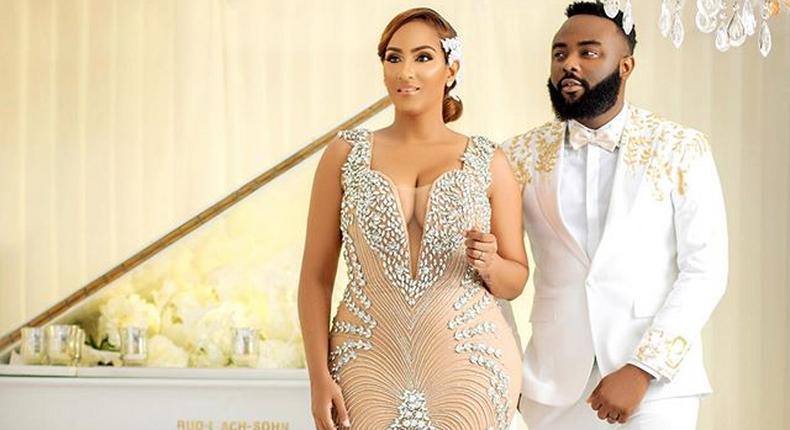 Juliet Ibrahim in wedding gown with mystery man