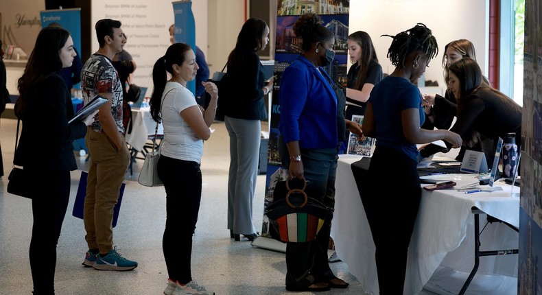 People looking for work should try networking and making a list of who they want to work for, according to career coach Stacey Perkins. Joe Raedle/Getty Images