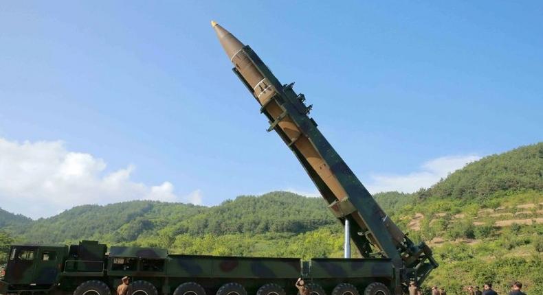 This picture taken and released on July 4, 2017 by North Korea's official Korean Central News Agency (KCNA) shows North Korean leader Kim Jong-Un (2nd R) inspecting the test-fire of the intercontinental ballistic missile Hwasong-14 at an undisclosed location.North Korea is believed to be preparing for a new missile test on July 27, a US defense offiicial said Tuesday