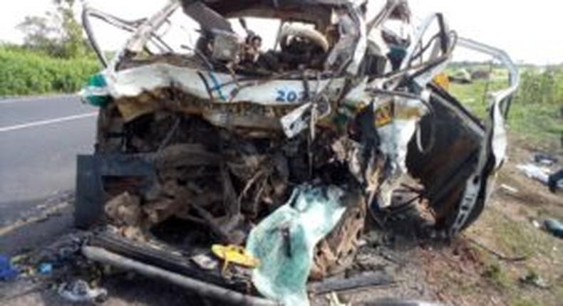 The wreck of the Toyota Hiace bus involved in an head-on collision with an articulated DAF truck at Bacita junction, on Ilorin-Jebba-Mokwa highway on Thursday    [NAN]