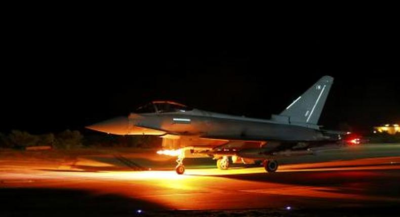 A British Royal Air Force Typhoon leaves for a mission from RAF Akrotiri in southern Cyprus December 4, 2015.