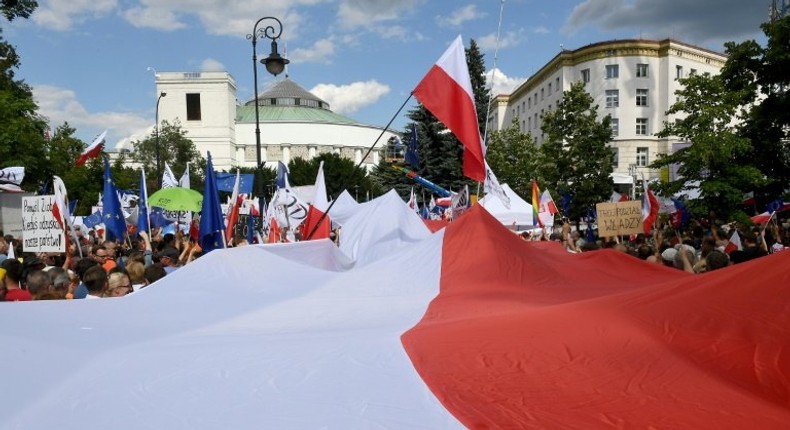 Hundreds of government opponents protest in front of the parliament building in Warsaw, on July 16, 2017