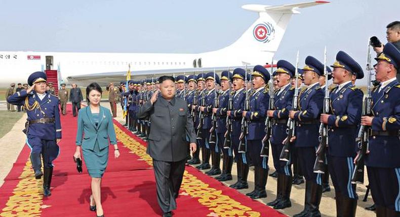 North Korean leader Kim Jung-Un, with wife Ri Sol-Ju inspecting a guard of honor. Jung-Un is the youngest dictator in the world.