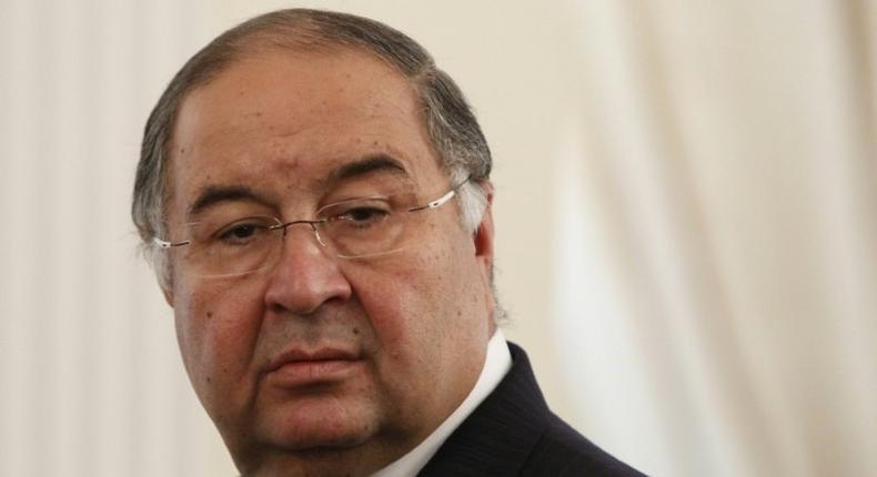 Uzbek-born Russian businessman Alisher Usmanov attends a meeting between Russian President Vladimir Putin and Crown Prince of Abu Dhabi Sheikh Abdullah bin Zayed al-Nahayan during their meeting at the Novo-Ogaryovo state residence outside Moscow September 12, 2013. AFP PHOTO / POOL / MAXIM SHEMETOVUzbek-born Russian businessman Alisher Usmanov attends a meeting between Russian President Vladimir Putin and Crown Prince of Abu Dhabi Sheikh Abdullah bin Zayed al-Nahayan during their meeting at the Novo-Ogaryovo state residence outside Moscow September 12, 2013. AFP PHOTO / POOL / MAXIM SHEMETOV